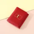Compact red women short wallet with cute bear outline and chic metal bow detail for daily use. - Red