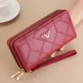 Red quilted long wallet, double zipper design, chic wrist strap, detailed leather texture. - Red