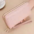 Pink women's long wallet double zipper PU leather clutch purse with wrist strap and chevron pattern. - Pink