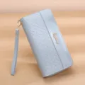 Light blue woven long wallet for women, large capacity zip purse with wrist strap and metal logo. - Blue