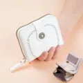 White short women's wallet, oil wax leather, hollow pattern, multiple card slots and coin pocket. - White