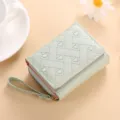 Cute light green short wallet for women with quilted heart embroidery and zipper coin pocket. - Green