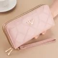 Pink quilted long wallet detail, double zipper design with wrist strap and metal hardware. - Pink