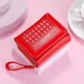 Compact red women short wallet with zipper pocket and stylish grid design for daily use. - Red