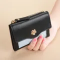 Short women's PU leather wallet with zipper coin purse, stylish card slots and floral clasp. - Black