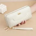 Women's long double zipper wallet PU leather clutch with wrist strap and geometric pattern - White