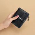 Women's short fashion faux leather wallet with multiple card slots and zipper coin pocket black. - Black