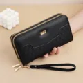 Stylish women's black long double-zipper wallet featuring woven pattern and hand strap. - Black