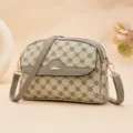 Stylish women's crossbody bag with classic monogram pattern, adjustable strap, daily wear. - Apricot
