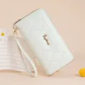 Women white quilted long wallet with wrist strap, elegant PU leather clutch purse for ladies. - White