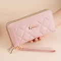 Pink long wallet for women, quilted PU leather zip-around clutch with wrist strap. - Pink