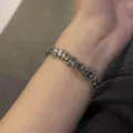 Detail shot of irregular metal pebble link bracelet, unique niche hip-hop jewelry style. - 18.5cm / Chip Stone Bracelet
