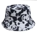 Detail view of the cute black and white cartoon panda pattern on the stylish fabric bucket hat. - M (56-58cm) / 30#