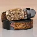 Men's leather belt featuring a detailed metal eagle automatic buckle and embossed western strap design. - 4018 Black Eagle Bronze Buckle / 110cm
