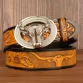 Men's leather belt featuring rhinestone bull head buckle and embossed floral pattern design. - Two-Tone Carved Bull Head with Silver Rhinestone Buckle / 105cm