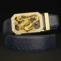 Close-up detail shot of luxury men rhinestone dragon buckle and textured leather belt body. - Blue Crocodile Claw Pattern Gold Buckle