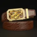 Detailed view of men's leather belt featuring a golden diamond-studded zodiac dragon buckle. - Brown Crocodile Claw Pattern Gold Buckle
