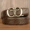Men's brown leather belt featuring a vintage metal bull head automatic buckle and textured strap. - Coffee Crocodile Claw Pattern Bull Head Silver Buckle