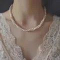 Multi-strand twisted imitation pearl choker necklace, elegant vintage clavicle accessory detail. - Spiral Pearl / White