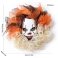 Halloween clown mask wreath with orange and black mesh for front door party decoration. - Scary Clown Wreath