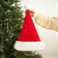 Red sequin Christmas hat with plush white trim and pom-pom, perfect for holiday festive decor. - Red Sequin Long Plush