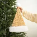 Gold sequin Christmas hat with white plush trim, festive holiday costume party accessory. - Gold Sequin Long Plush