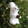 White flocked squirrel Christmas tree ornament with pine cone and size dimensions. - Large Squirrel