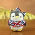 Cute plush penguin pendant toy with blue check bib and bow, perfect fluffy bag accessory. - Approx 10cm / Blue