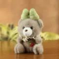 Cute plush teddy bear keychain pendant with green bow and strawberry charm, soft toy bag decor - Dark Brown