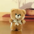 Plush teddy bear pendant keychain, cute brown fluffy doll toy with pearl ribbon decoration - Brown / 12cm