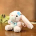 Llavero de conejito de peluche rosa lindo con lazo azul y piruleta, colgante de bolsa regalo - Estilo con Accesorio Azul / Rosa