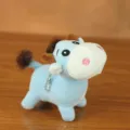 Simpatico portachiavi mucca di peluche blu, morbido ciondolo bambola per borsa. - Blu