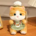 Adorabile portachiavi gatto peluche arancione con cappello da cuoco e grembiule. - Ciondolo Peluche Gattino / Circa 18cm Autorizzato / Strisce Arancioni