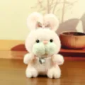Détail de jouet lapin peluche rose avec pendentif cœur et joli nœud pour sac à main - Style Coeur / Rose Clair / Environ 15cm