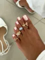 Conjunto de anillos de dedo del pie de verano dorados con estrella de mar y concha. - Oro claro-07389
