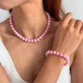 Elegantes rosa Perlen Halskette und Armband Set für Damen, idealer Sommerschmuck. - Set (0051) / Hellrosa