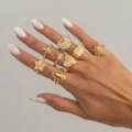 Gold statement ring set featuring multiple geometric and floral designs for women daily wear. - Vintage Carved Rhinestone Ring Set (07141) / Gold