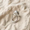 Minimalist abstract open ring detail, showing the unique sculptural fluid silver design surface. - Silver Irregular Streamlined Hollow Open Ring (JZ5589-1) / Open Adjustable