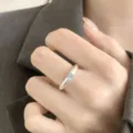 Minimalist silver ring with light blue stone, elegant tree texture design for women. - Open Adjustable / Tree Pattern Closed