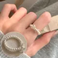 Elegant imitation pearl bow ring for women, stylish open finger ring with dainty design. - Imitation Pearl Bow Ring(JZ7862)