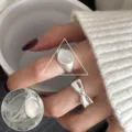 Minimalist 925 sterling silver ring set featuring a white gemstone and cute bow design. - JZ7406