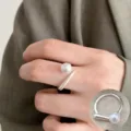 Elegant open ring for women featuring imitation pearl and sleek geometric design, stylish. - Faux Pearl Cone Open Ring
