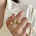 Minimalistische gouden geometrische open ring voor dames, stijlvol modieuze sieraden. - Open Verstelbaar / Glanzend Gouden Geometrische Stijl (JZ5603-2)
