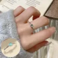 Korean style twisted silver ring with blue gemstone, elegant open geometric ring for women. - Twisted Blue Gemstone Open Ring