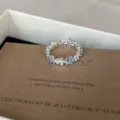 Silver flower ring with blue stones, dainty stacked open ring for women fashion jewelry. - Open Adjustable / Continuous Small Flowers