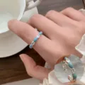 Elegant silver ring featuring alternating blue stones and sparkling crystals for women variant. - Open Adjustable / Blue Marquise Stone