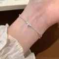 Silver heart chain bracelet, minimalist twist wrist jewelry for women, elegant daily accessory. - Multi-Heart Beaded Twisted Chain Bracelet (SL4024)