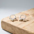 Close-up detail of cute dachshund shaped silver hoop earrings, showing fine craftsmanship. - Silver Dachshund Style (ED2632-1)