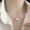Silver cylindrical pendant necklace with delicate chain, elegant minimalist clavicle jewelry. - Silver Mesh Cylinder Pendant (XL2240)