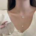 Silver Y-shaped clavicle necklace with bow and heart pendant for women, stylish jewelry. - Y-chain Bowknot Heart Pendant Necklace (XL2161)